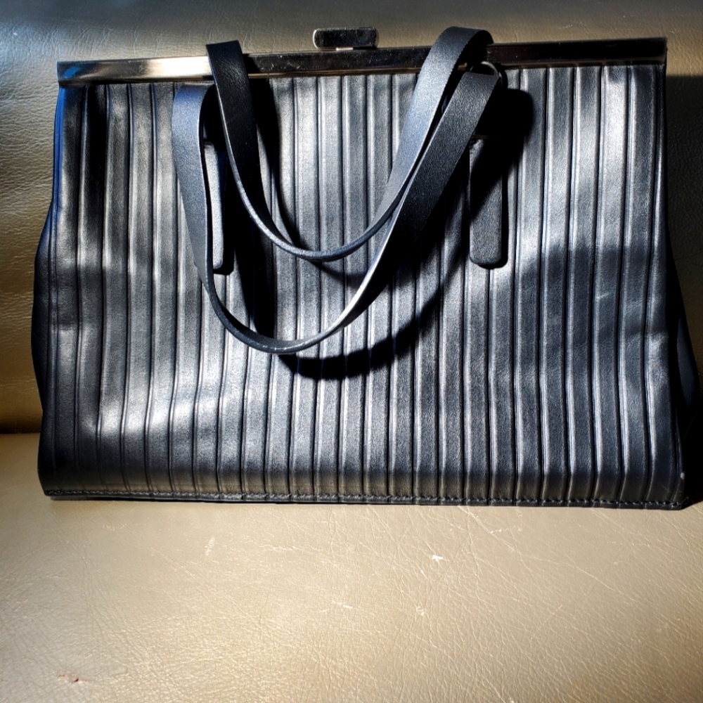 LIA NUMA gorgeous new hand bag soft black leather with blue suede interior.